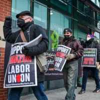 Activists in Philadelphia rally in support of Amazon workers, January 2022.